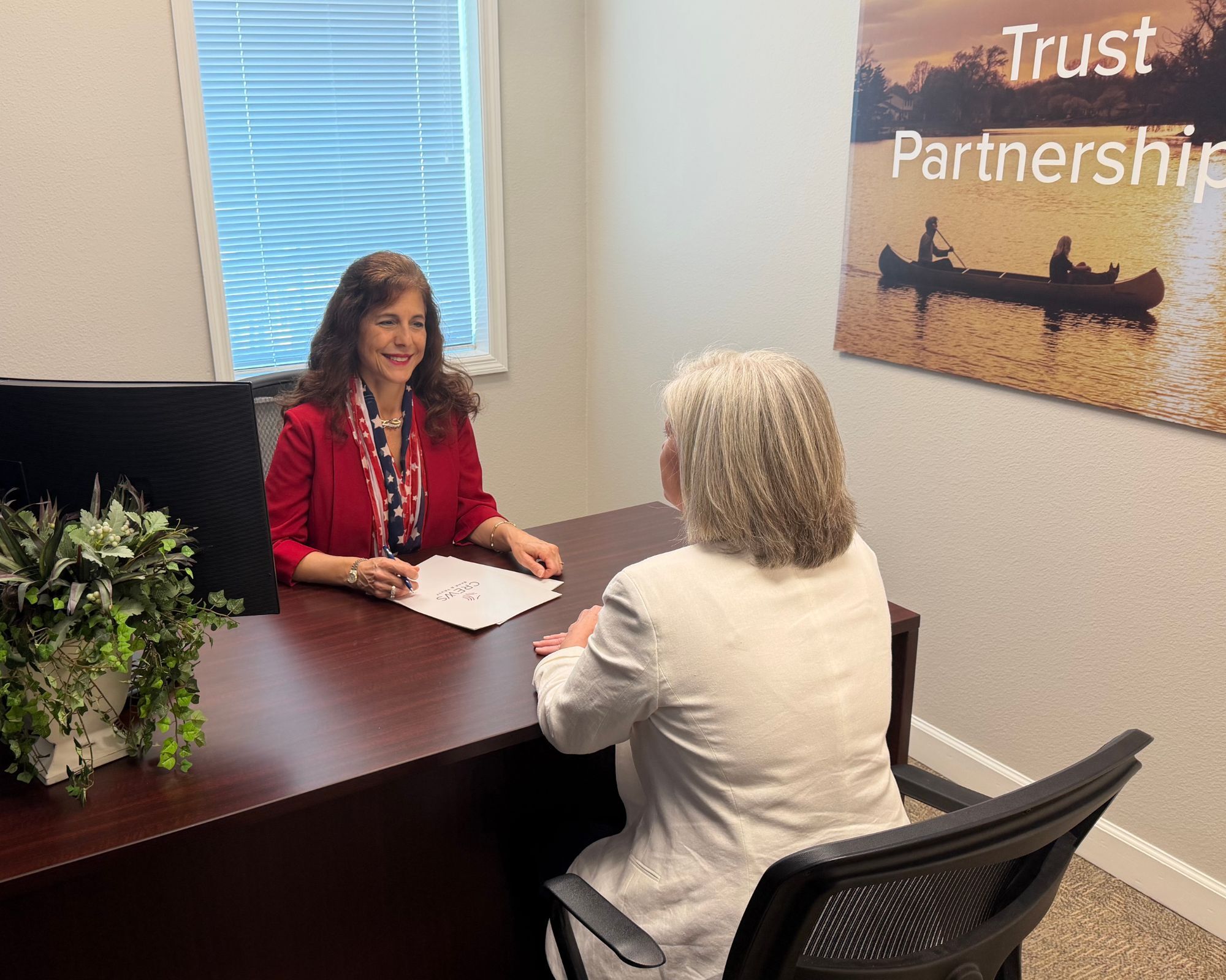 Christine reviewing documents