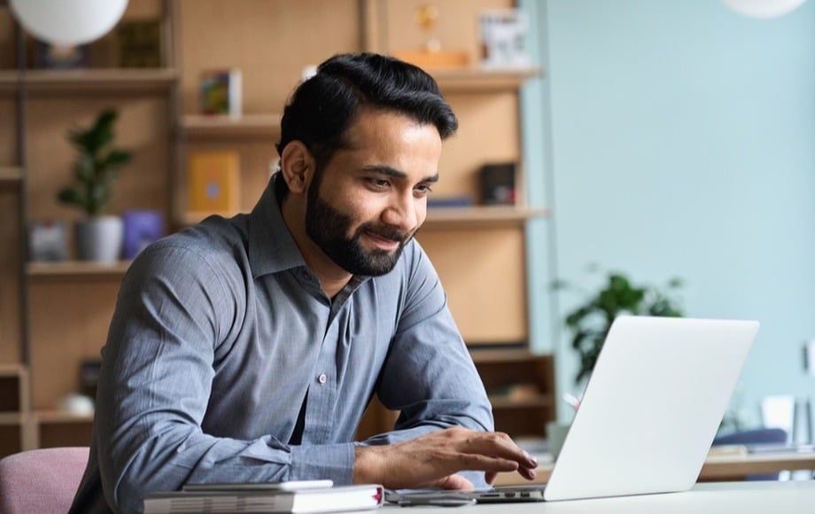 man working on laptop