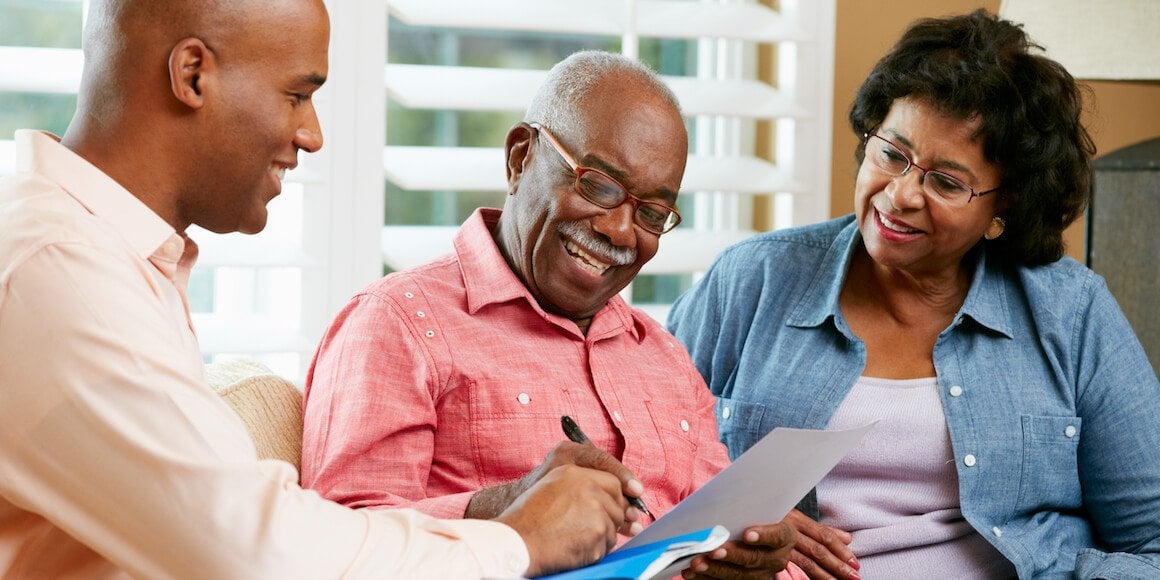 Group of people going over paperwork