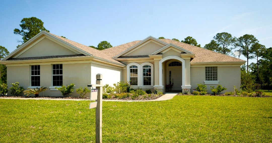 home with for sale sign out front