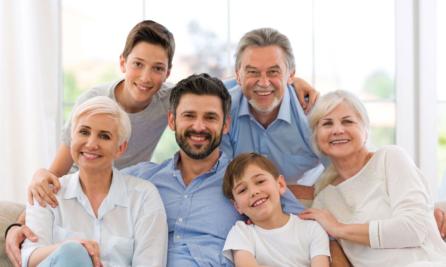 Multi-generational family posing for a photo