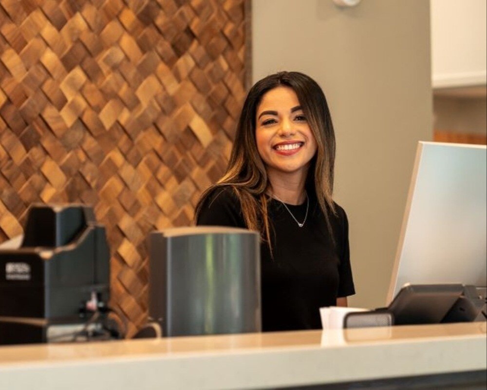 smiling-crews-bank-teller