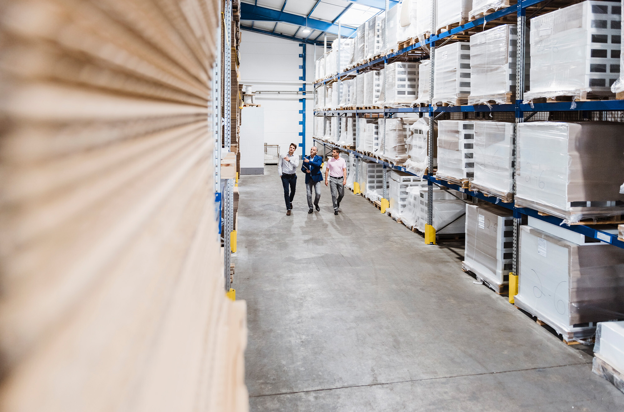 business-people-meeting-in-company-storehouse-2023-11-27-04-51-10-utc (1)