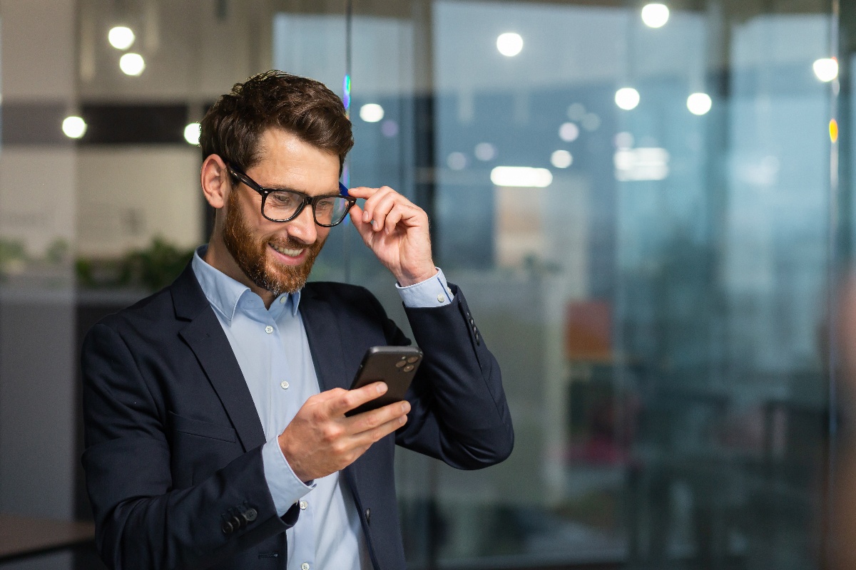 middle-aged-professional-checking-bank-balance-on-mobile-device